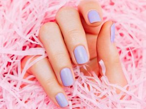 Pastel Builder in a Bottle nails on pink shredded paper