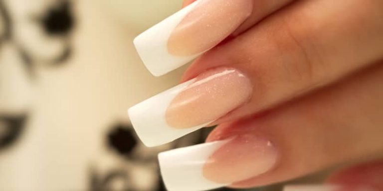 French manicure nails with a crisp reverse smile line