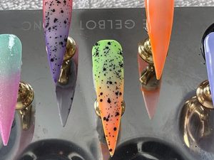 Pastel milky ombre nail designs on display tips