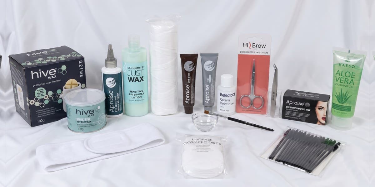 Eyebrow Definition Kit: wax heater and hot wax, Apraise brow tints and shaping wax, Hi Brow scissors and tweezers